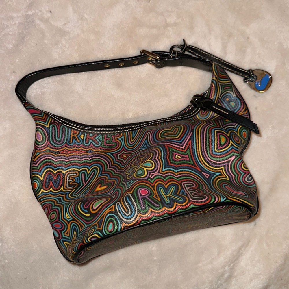 Real vintage Dooney and Bourke bucket purse in perfect condition.